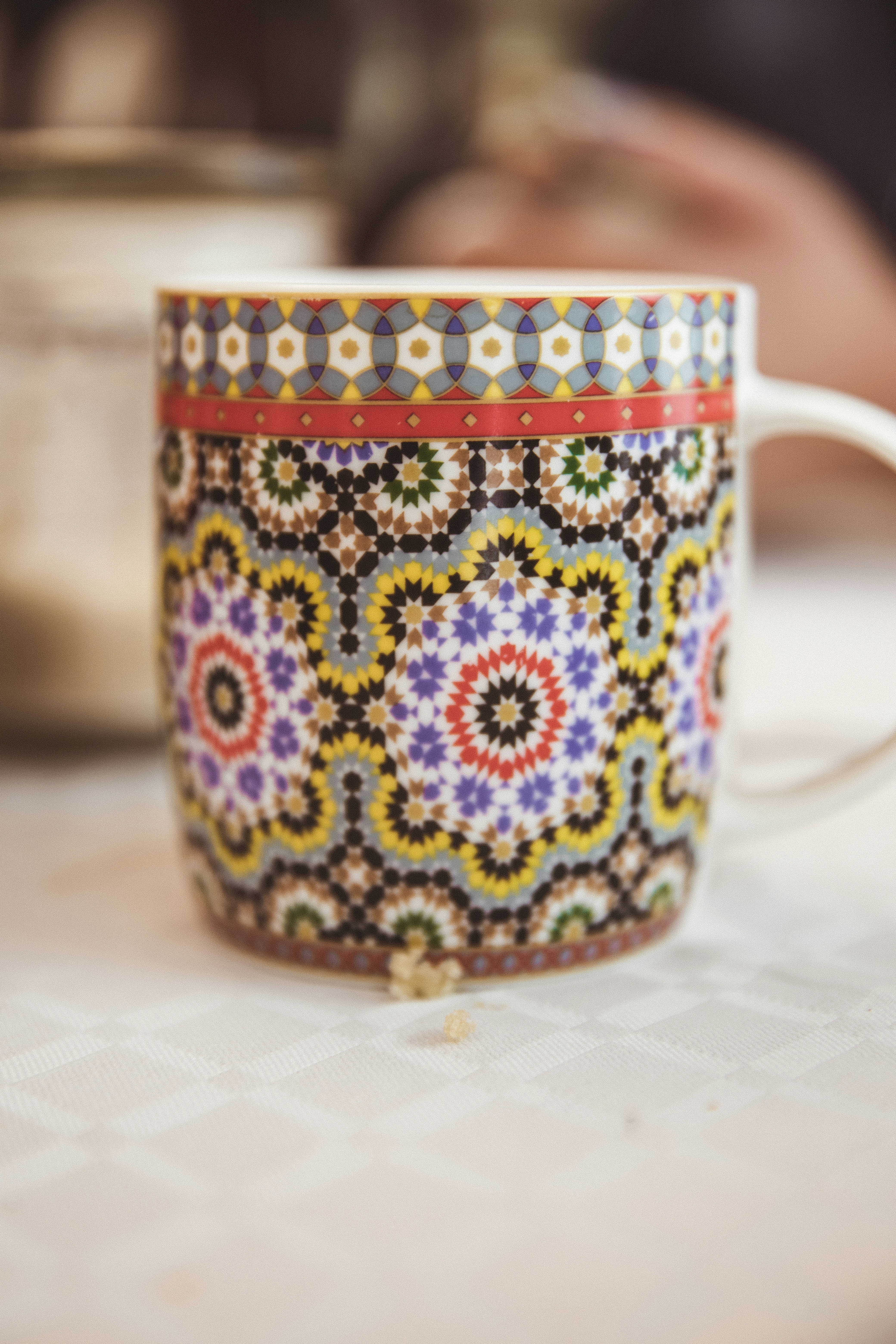 Personalized coffee mugs featuring intricate designs and inspiring quotes.